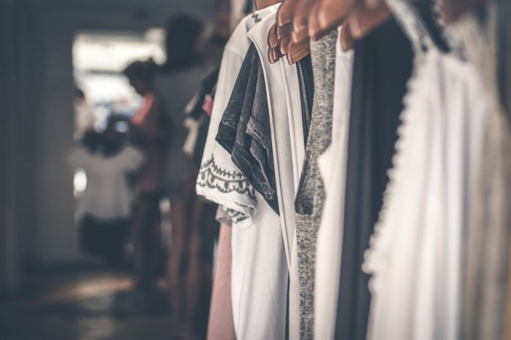 clothing on rack in retail store