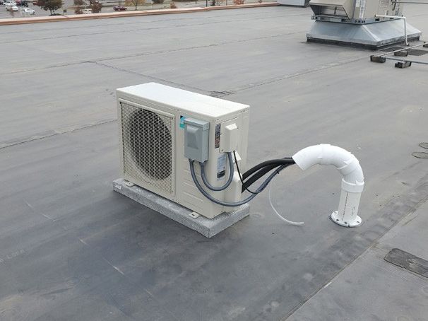 New rooftop HVAC unit installed for an added clinic room